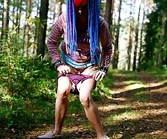 Kinky tart pisses in the middle of a forest road