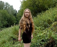 Dirty teen slut sits for a piss on a picnic table