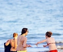 Nice butted girls in colorful bikinis