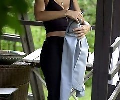 Spy from the bushes on a changing girl